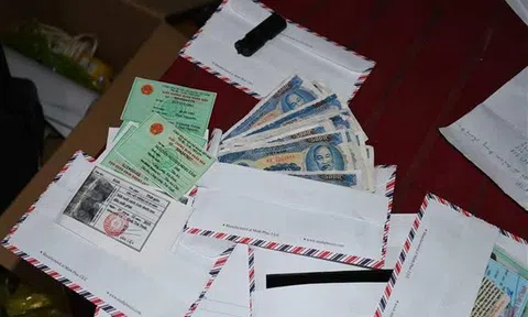 Bắt giữ cặp vợ chồng làm tiền giả mệnh giá 5.000 đồng