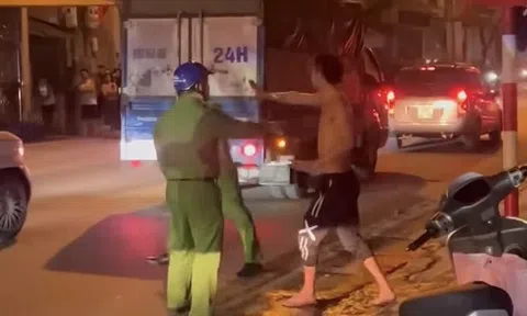 Khống chế gã thanh niên cầm dao dọa chém người đi đường