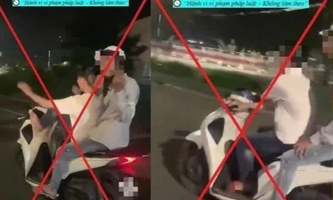 Nam thanh niên lái xe máy bằng chân trên đường phố Đà Nẵng