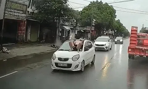 Xác định nguyên nhân người đàn ông nằm trên ca pô ôtô