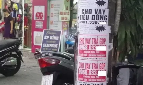 Hà Nội: Vẽ sản phẩm quảng cáo trên cột điện, cây xanh bị phạt tới 20 triệu đồng